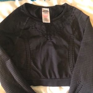 Gymshark glow long sleeve seemless crop top in size medium and black